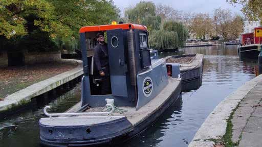 WHH Bantam push tug on an urban canal