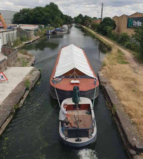 Compact WHH mini tug viewed from above inside a lock