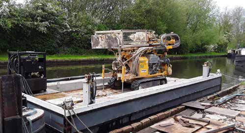 Split pontoon configured with a crane and stabilising beams
