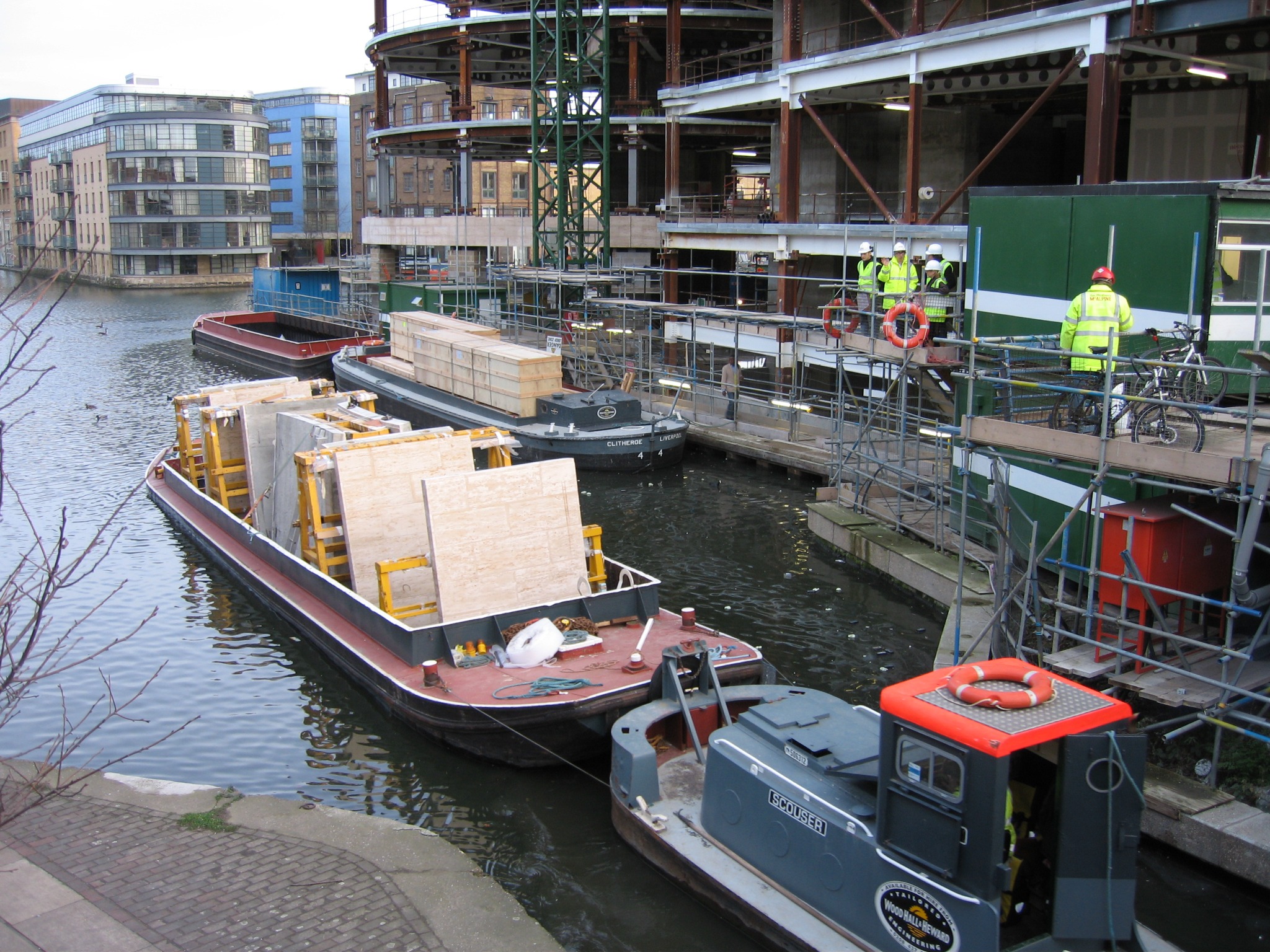 WHH barges arriving at King's Place carrying prefabricated building components