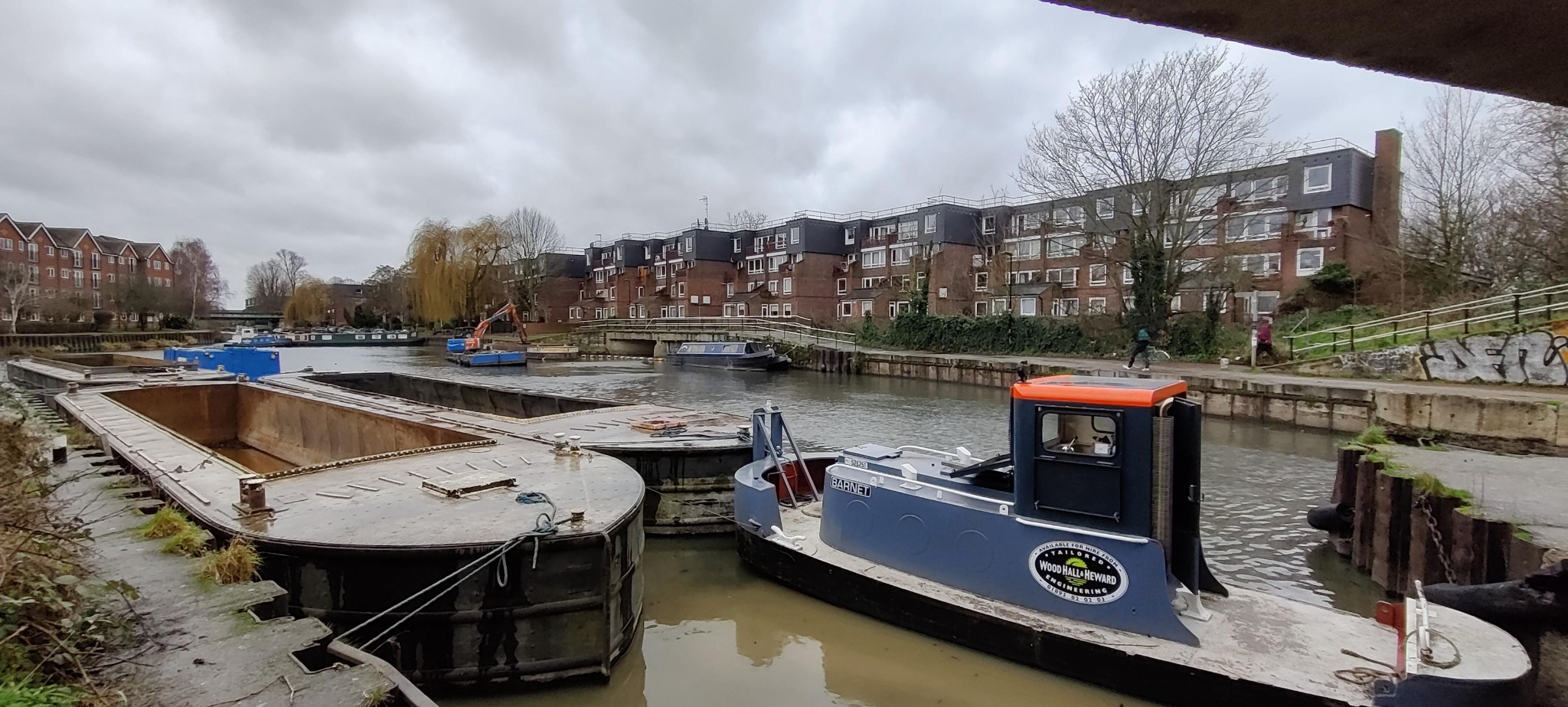 WHH tug and hoppers supporting a dredging operation