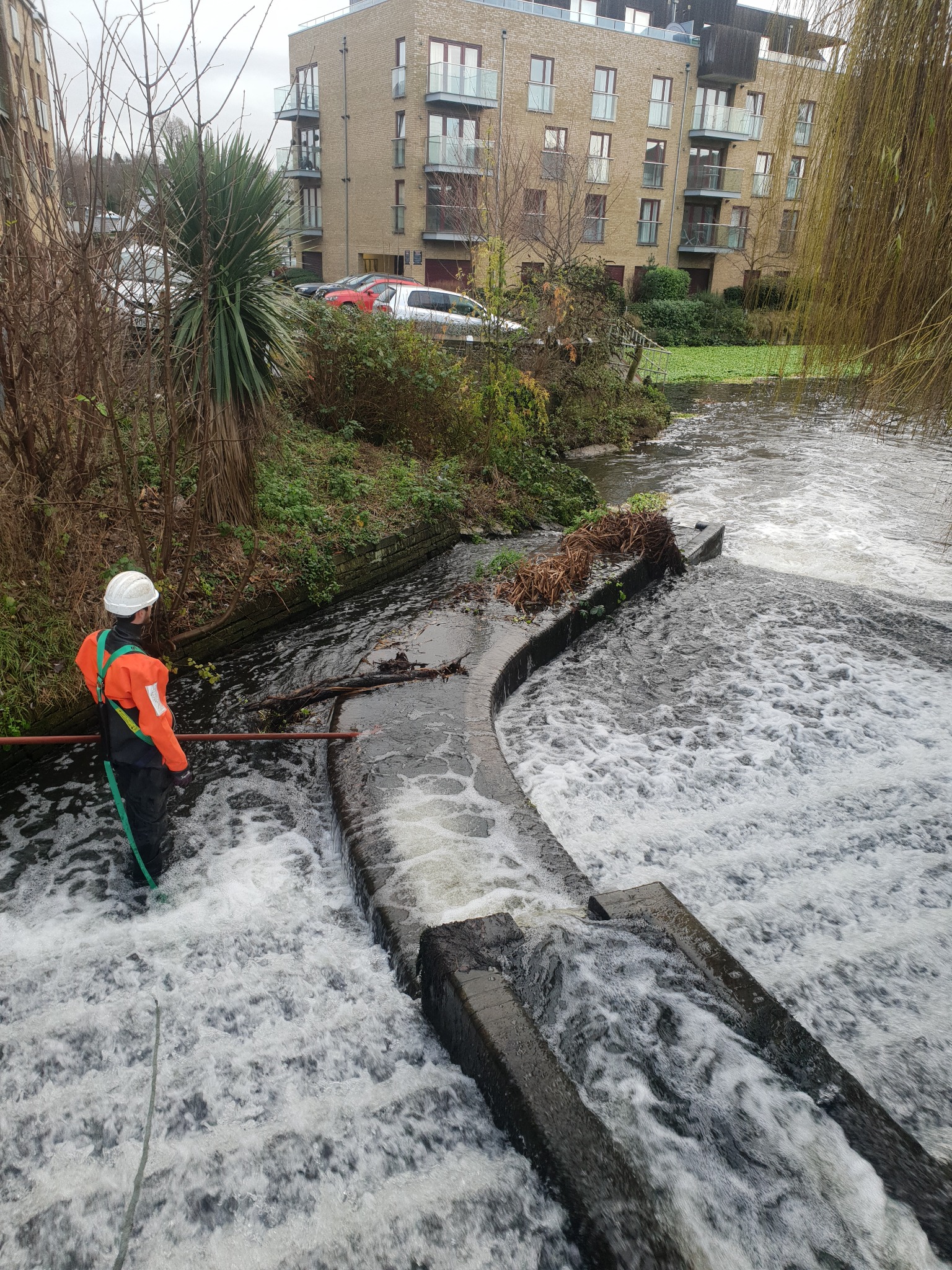 WHH operative inspecting a weir for a riparian owner