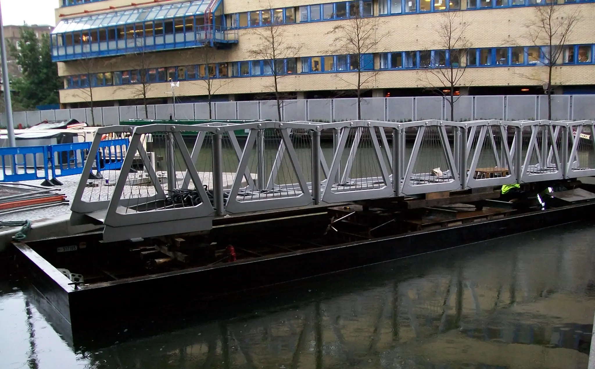 Paddington Basin's Rolling Bridge supported lengthways on the bespoke WHH pontoon