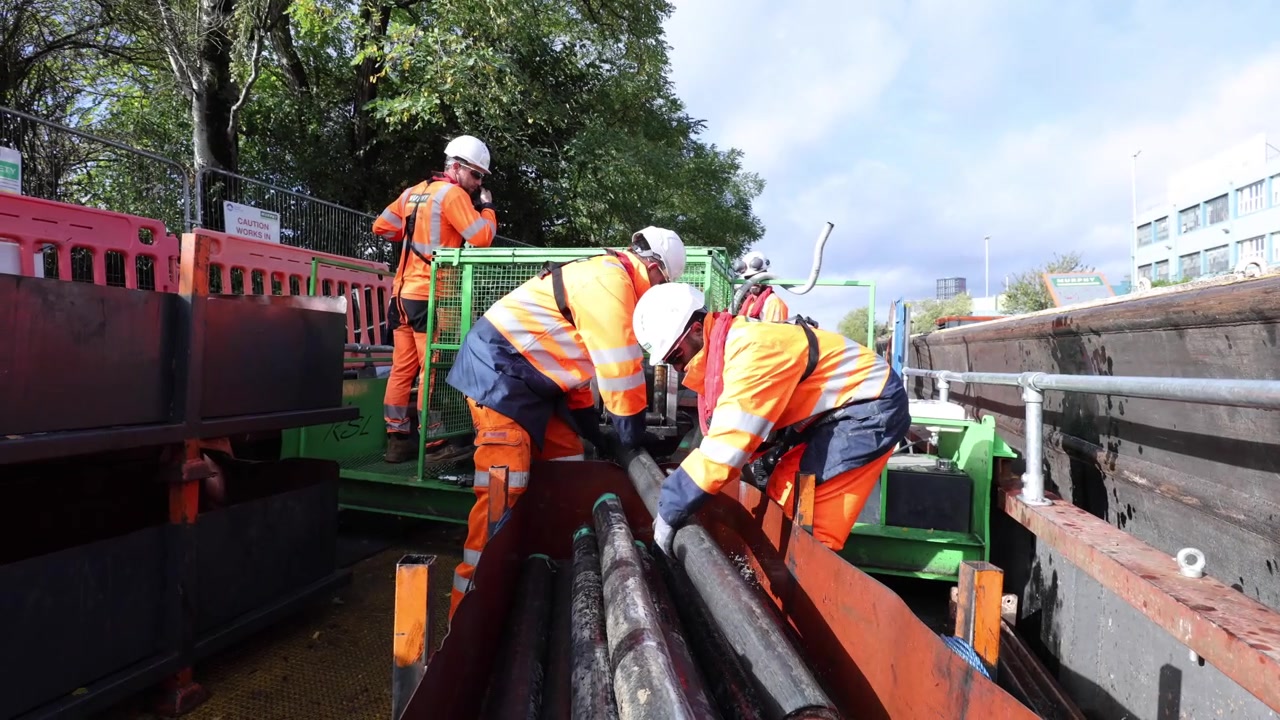 WHH and Murphy crews working with cable handling plant beside the canal
